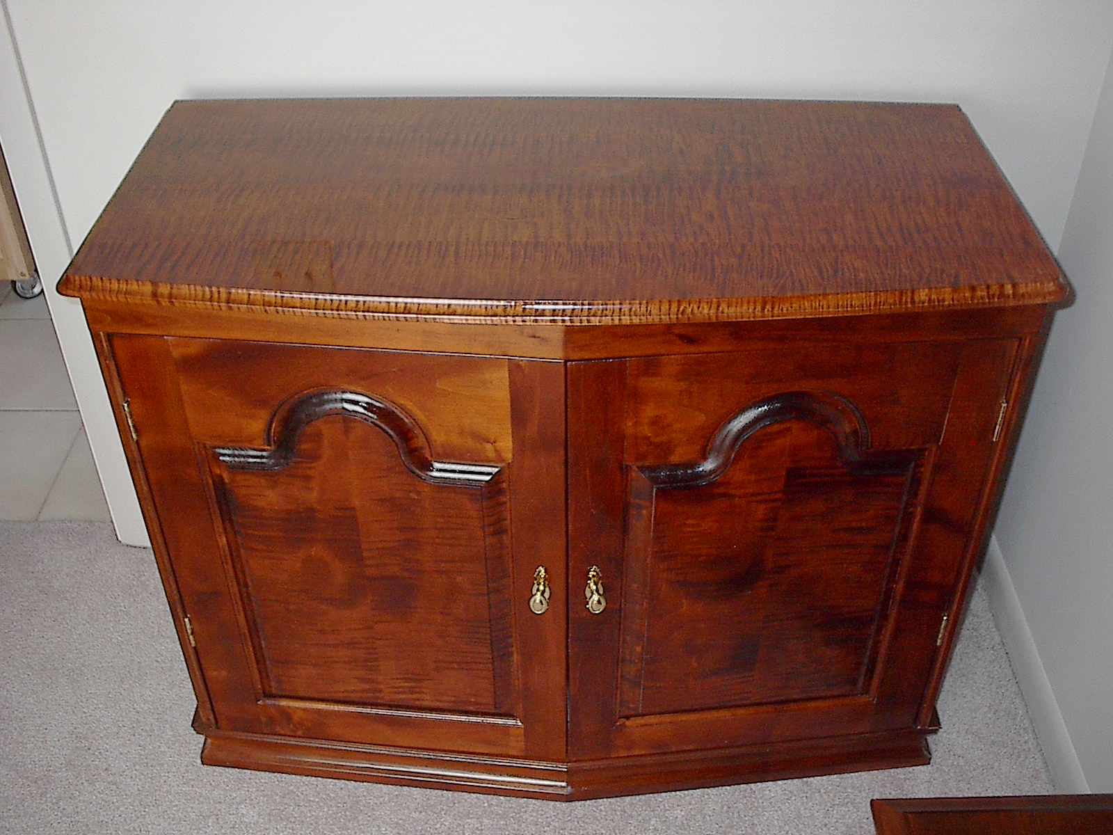 Handcrafted figured maple credenza